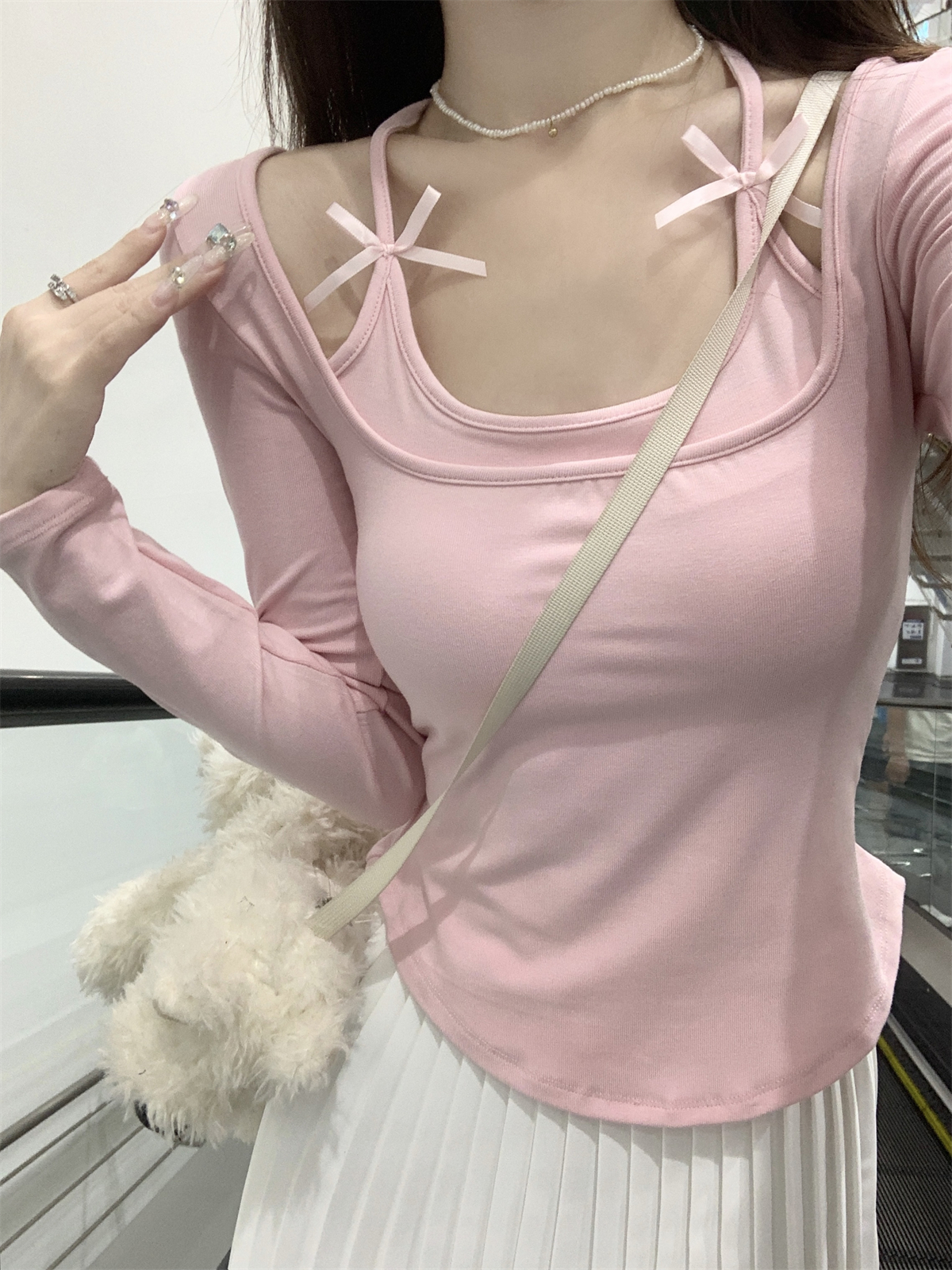 Actual shot of early autumn Korean version of pure desire halter neck bow fake two-piece slimming design pure cotton long-sleeved T-shirt top