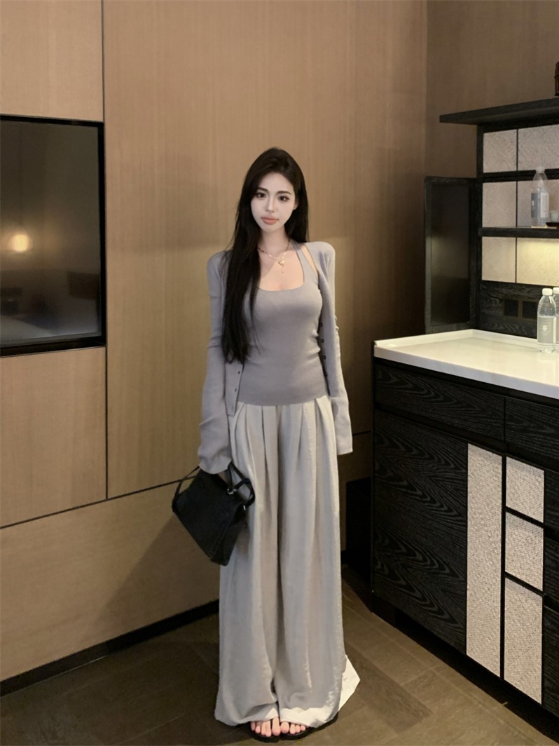 Actual shot of knitted cardigan jacket, long-sleeved halterneck two-piece set + floor-length drapey textured and wrinkled slouchy trousers
