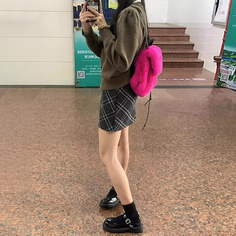 American retro design niche plaid hip-hugging short skirt for female Maillard to wear with autumn slimming A-line skirt
