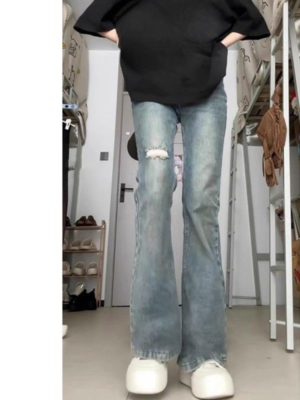 European and American retro blue ripped micro-flared jeans for women 2024 new high-waist slim horseshoe long pants