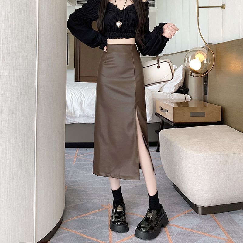 Real shot of temperament slit PU leather skirt for women autumn high waist A-line skirt mid-length hip-hugging one-step skirt