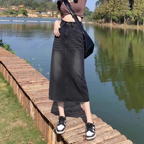 Large size black and gray denim skirt women's new pear-shaped figure covering the crotch and slimming slit mid-length A-line skirt