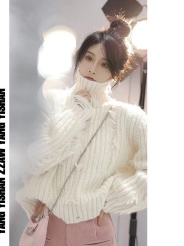 Small Internet celebrity fashion ripped tassel turtleneck pullover sweater early autumn new casual loose top trend