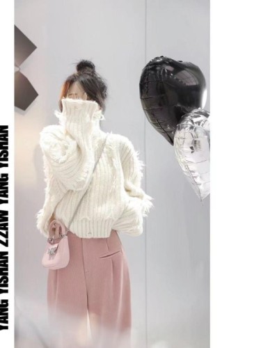 Small Internet celebrity fashion ripped tassel turtleneck pullover sweater early autumn new casual loose top trend