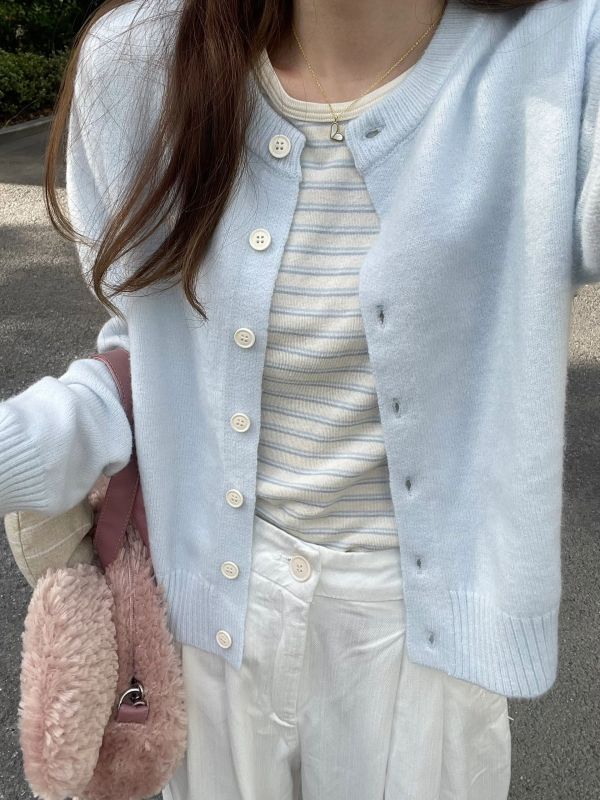 Lazy loose round neck buttoned solid color knitted cardigan