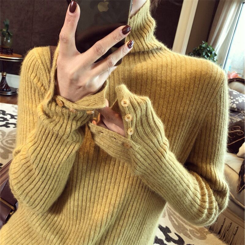 Piles of turtlenecks with New Year's red sweaters for women. Autumn and winter hot European style knitted bottoming shirts with soft waxy tops for women.