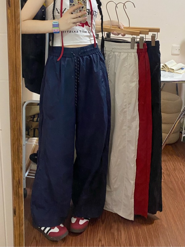 Acetate waistband, covered back pockets, nine-quarter wide-leg pants