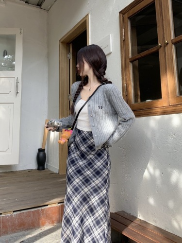 Autumn Korean style versatile twist knitted cardigan + pure desire camisole + plaid skirt