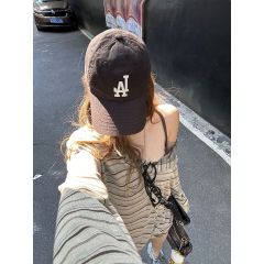 Striped off-shoulder long-sleeved T-shirt for women 2024 spring and autumn new style high-end lazy style loose one-line collar pullover top