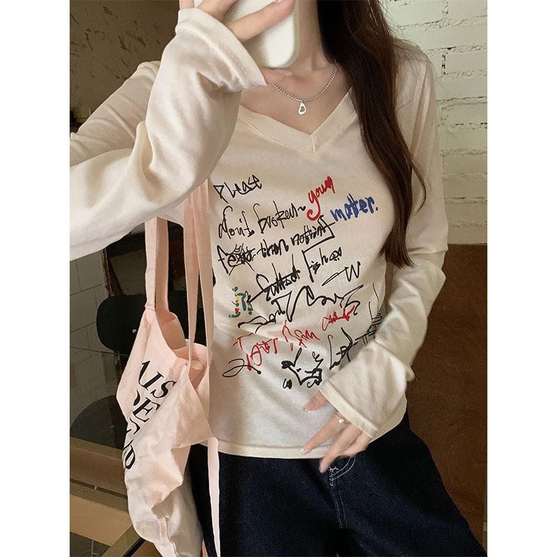Photographed graffiti print V-neck long-sleeved women's early autumn thin design back-holed slimming top