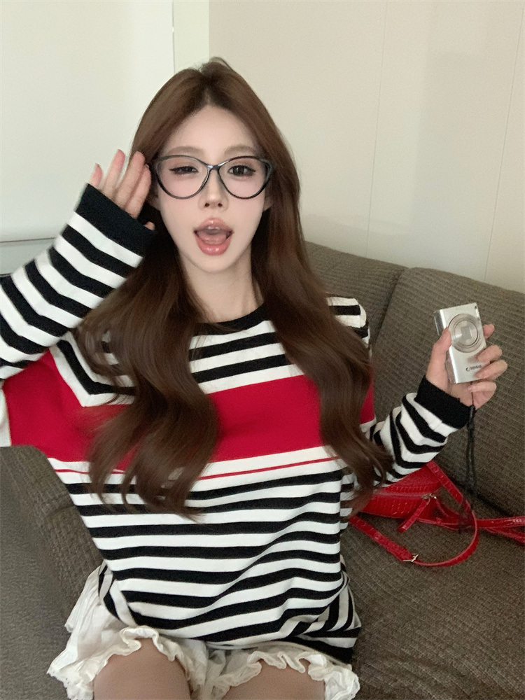 Actual shot of new fall style contrasting striped lazy knitted top