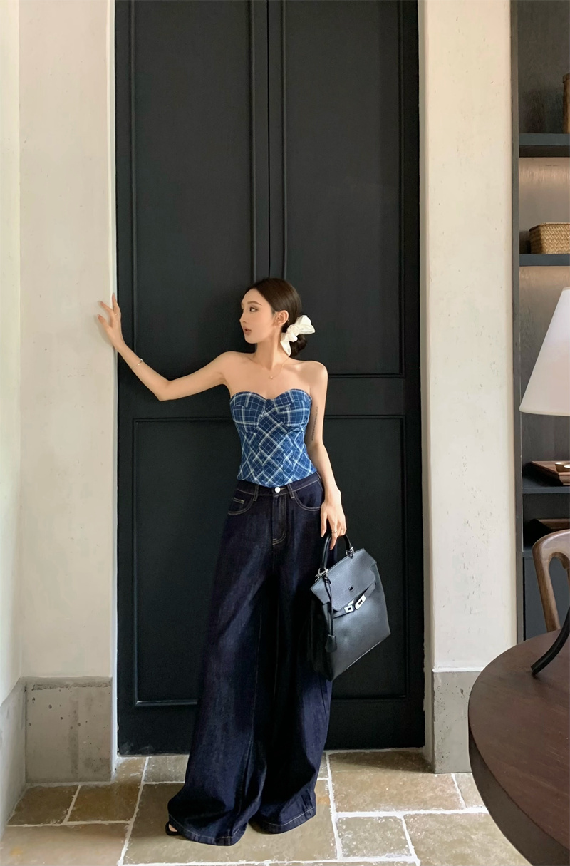 Photographed stylish and bold girl's high-waisted wide-leg denim pants + plaid crop top