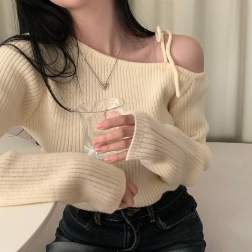 Korean chic autumn and winter niche retro irregular oblique collar off-shoulder lace-up slim slim long-sleeved knitted sweater for women