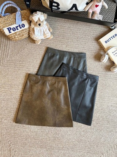 Real shot of new autumn and winter black coffee color leather skirt high waist slim PU leather A-line short skirt for women