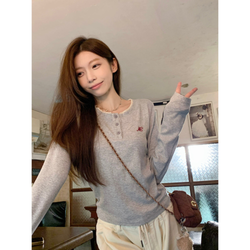 Real shot of autumn and winter Korean style lace splicing round neck button design fake two-piece T-shirt long-sleeved bottoming top