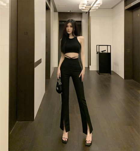 Real shot of black wang cross-lace bootcut pants for women with high waist and slim slit trousers