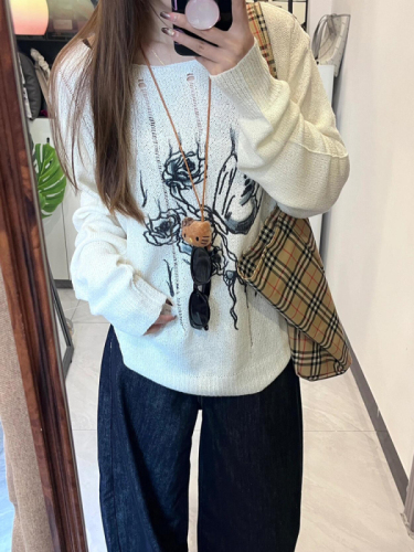 French-style chic hollow-out ripped crewneck long-sleeved sweater women's autumn new loose-fit slimming versatile knit top