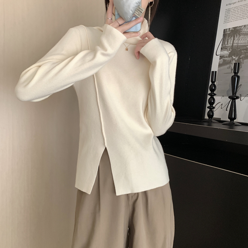 Turtleneck sweater for women in autumn and winter, thick white inner layer, high-end knitted bottoming shirt, niche slit top with design