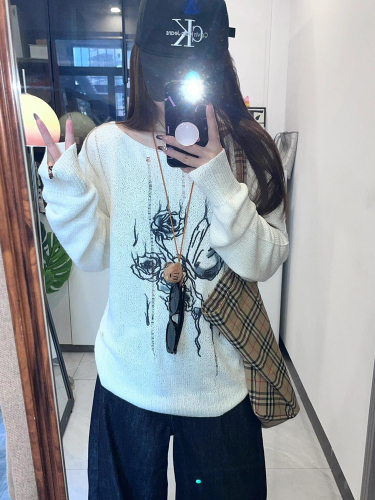 French-style chic hollow-out ripped crewneck long-sleeved sweater women's autumn new loose-fit slimming versatile knit top
