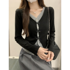 Real shot of Korean style bow V-neck long-sleeved T-shirt for women in autumn design contrasting color stitching fake two-piece short top