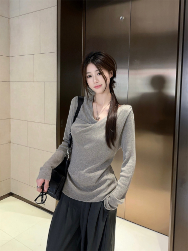 Actual shot ~ Design sense, niche swing collar, irregular slimming, loose and versatile long-sleeved knitted T-shirt