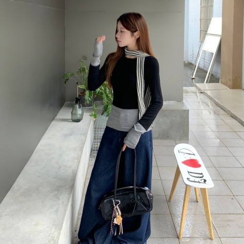 Real shot of black fake two-piece contrasting long-sleeved T-shirts for women, irregular autumn wear, slim-fitting T-shirt tops