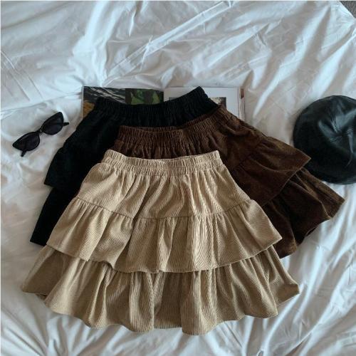 Real shot of autumn and winter retro knitted striped skirt