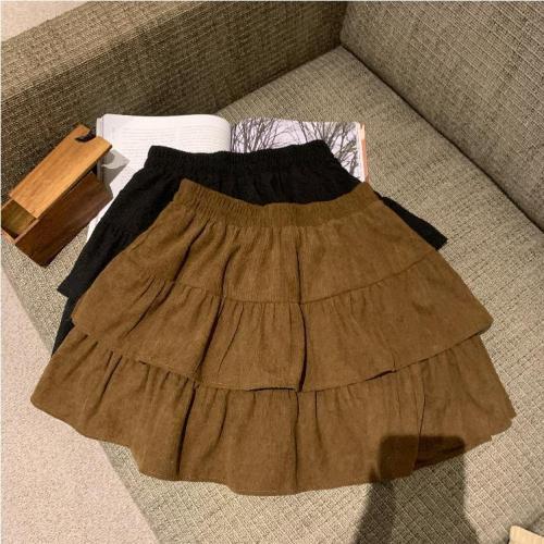 Real shot of autumn and winter retro knitted striped skirt