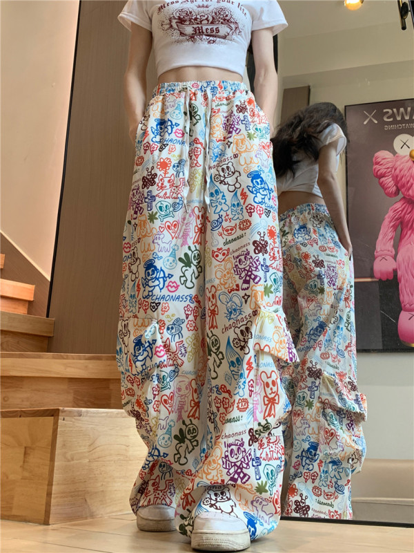Graffiti-printed overalls with design, large pockets, loose straight-leg dancing casual pants for women
