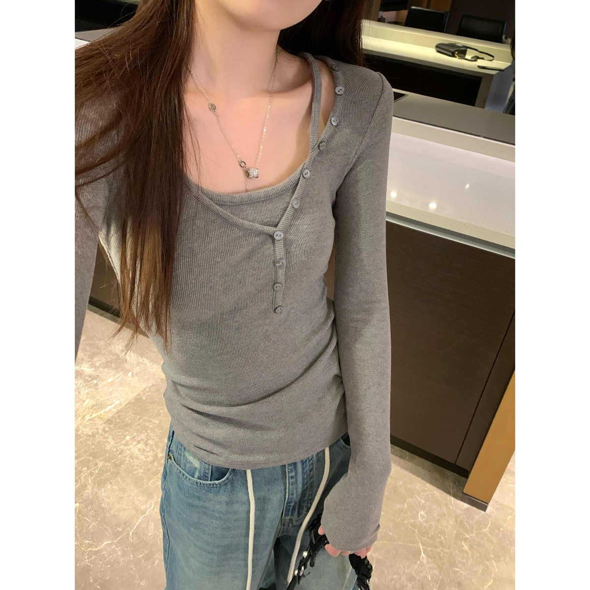 Actual shot of autumn and winter Korean version v-neck temperament irregular button design fake two-piece long-sleeved T-shirt with inner top