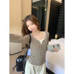 Real shot of autumn and winter Korean version slimming contrast button design fake two-piece slimming long-sleeved T-shirt bottoming top