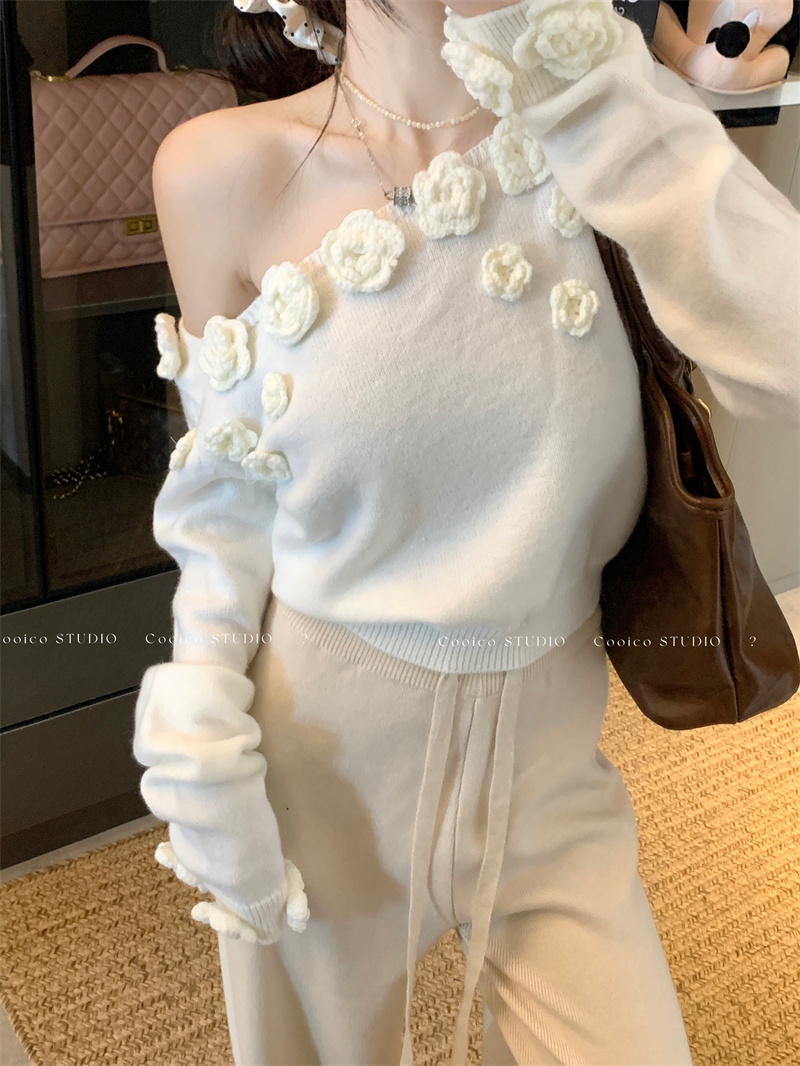 Real shot of French white three-dimensional flower slanted shoulder sweater for women in autumn and winter with design off-shoulder sweater top