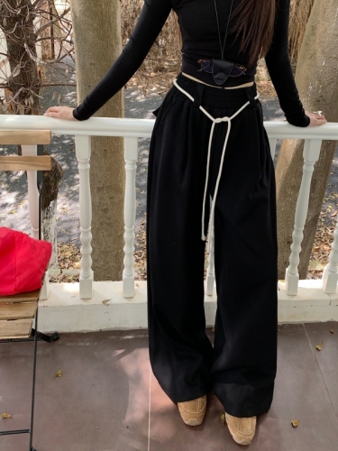 Actual shot of lazy style casual high-waisted straight wide-leg trousers with drapey floor-length trousers for women