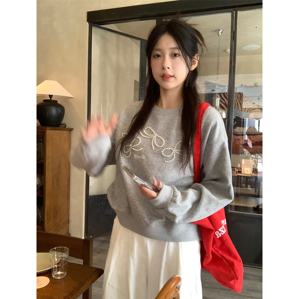 實拍秋季韓版寬鬆圓領重工釘珠蝴蝶結減齡休閒百搭套頭衛衣女