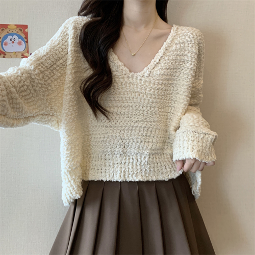 Actual shot of new design large V-neck knitted sweater top for women