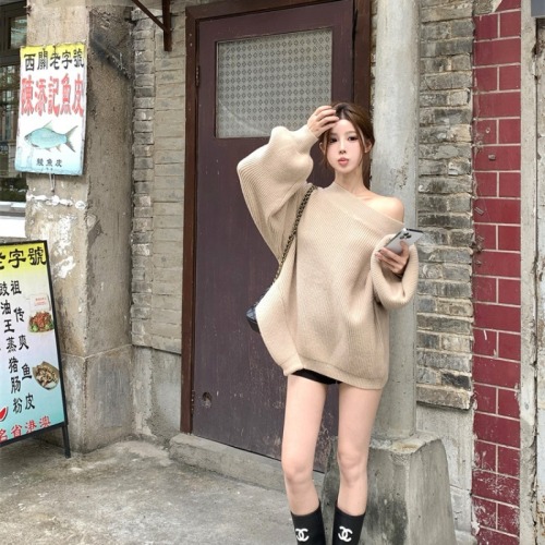 Actual shot of lazy style irregular loose casual pullover sweater