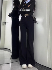 Women's black elastic winter high-waisted tapered jeans with plush lining, flattering for pear-shaped figures, featuring a bell-bottom and hoof-shaped design.