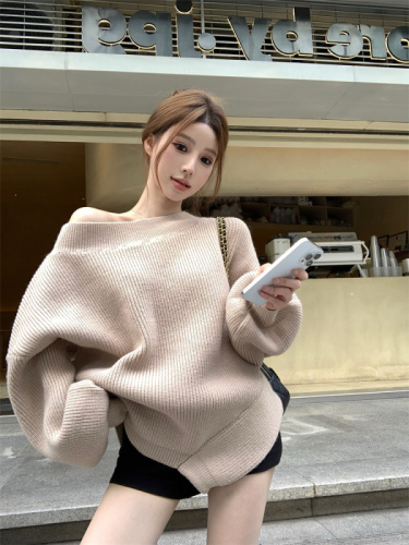 Actual shot of lazy style irregular loose casual pullover sweater