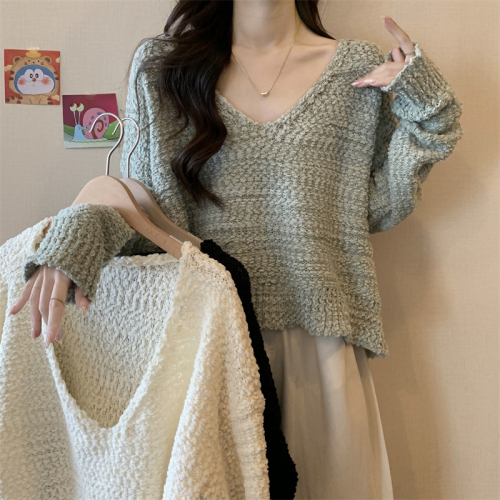 Actual shot of new design large V-neck knitted sweater top for women