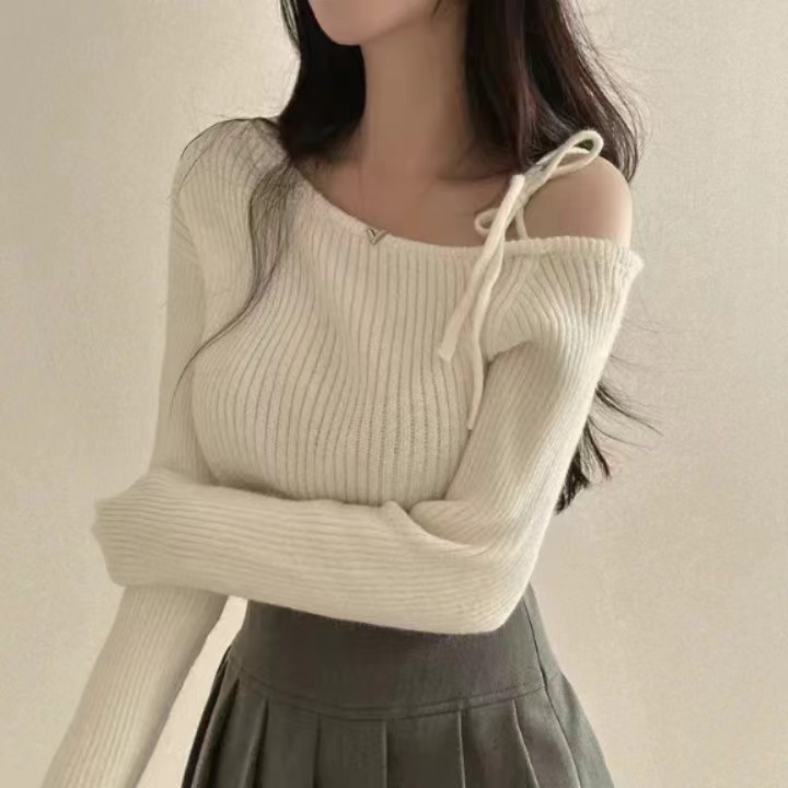 Korean chic autumn and winter niche retro irregular oblique collar off-shoulder lace-up slim slim long-sleeved knitted sweater for women