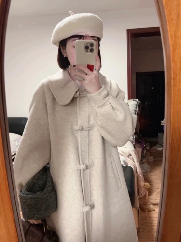 Long woolen coat for women in spring and autumn, small Korean style, retro doll collar, plate-button woolen coat, high-end