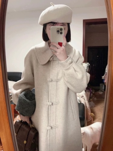 Long woolen coat for women in spring and autumn, small Korean style, retro doll collar, plate-button woolen coat, high-end