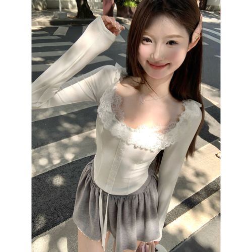 Real shot of girl's lace ruffled arc hem design slimming top