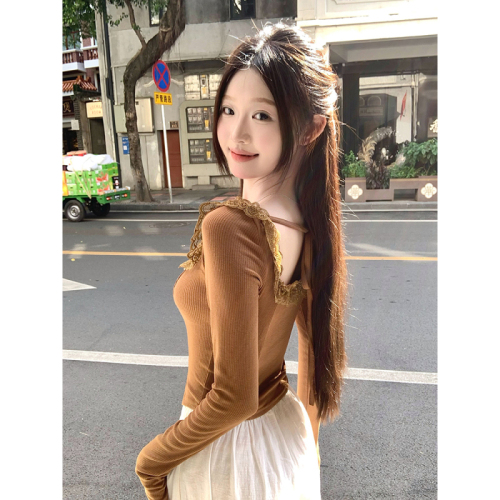 Real shot of girl's lace ruffled arc hem design slimming top