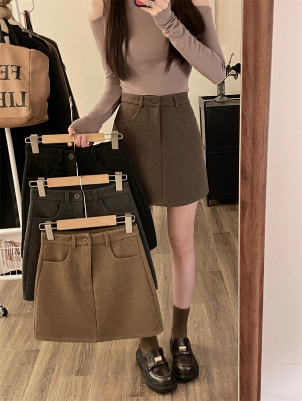 American hot girl high-waisted woolen hip-hugging skirt for women in winter black anti-exposure sexy short skirt