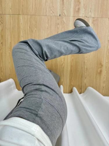 Grey drawstring casual yoga pants for women, autumn high-waisted slimming straight-leg wide-leg pants with a draping floor-length design.