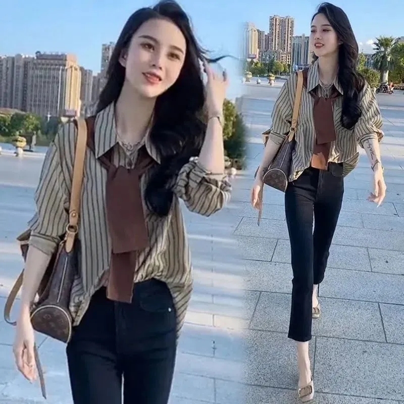 Official picture of early autumn new spring and autumn women's long-sleeved shirt fake two-piece striped shirt shawl top to cover the belly