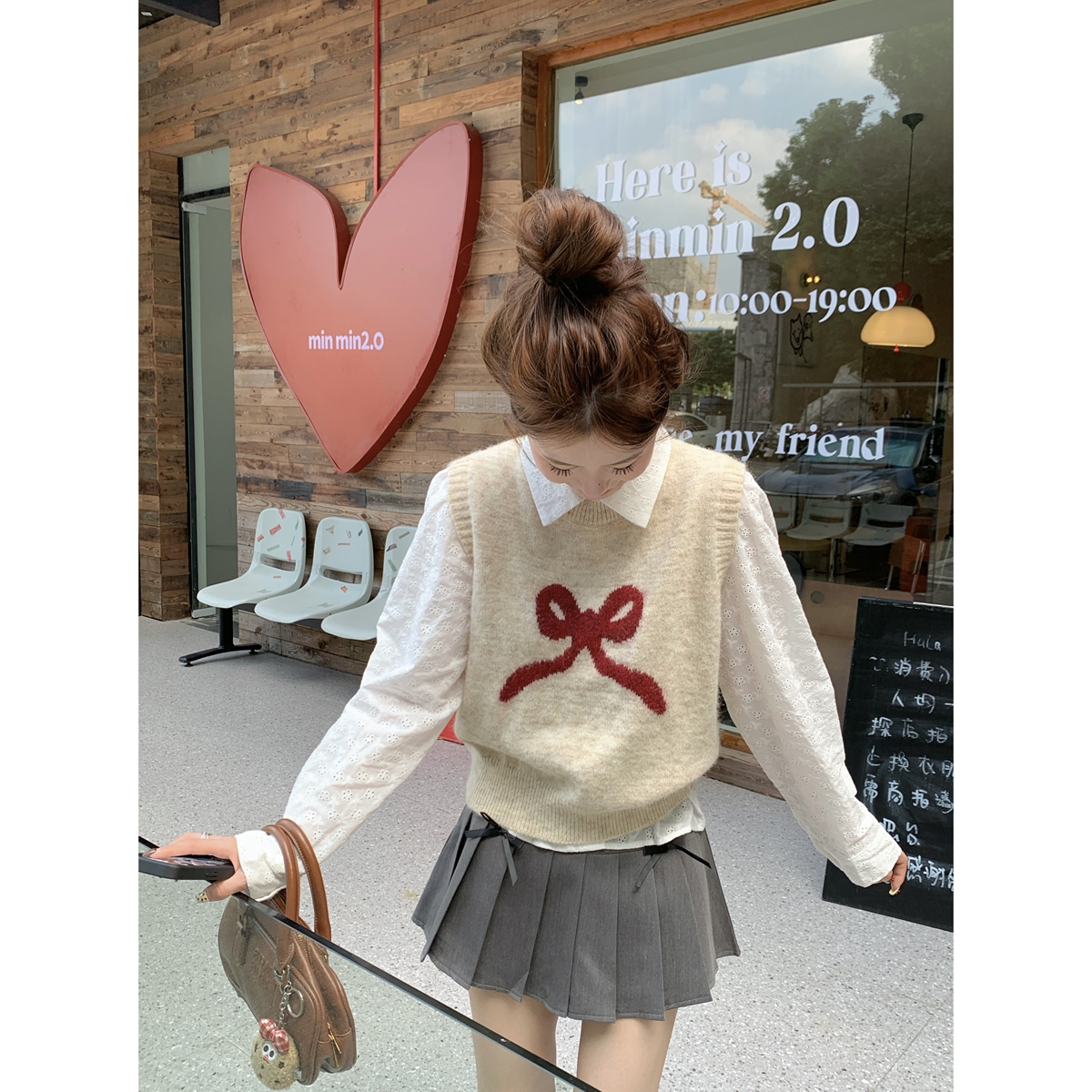 Photo shoot Korean version loose youthful bow floral pattern containing wool knitting vest for women to wear over layered tops