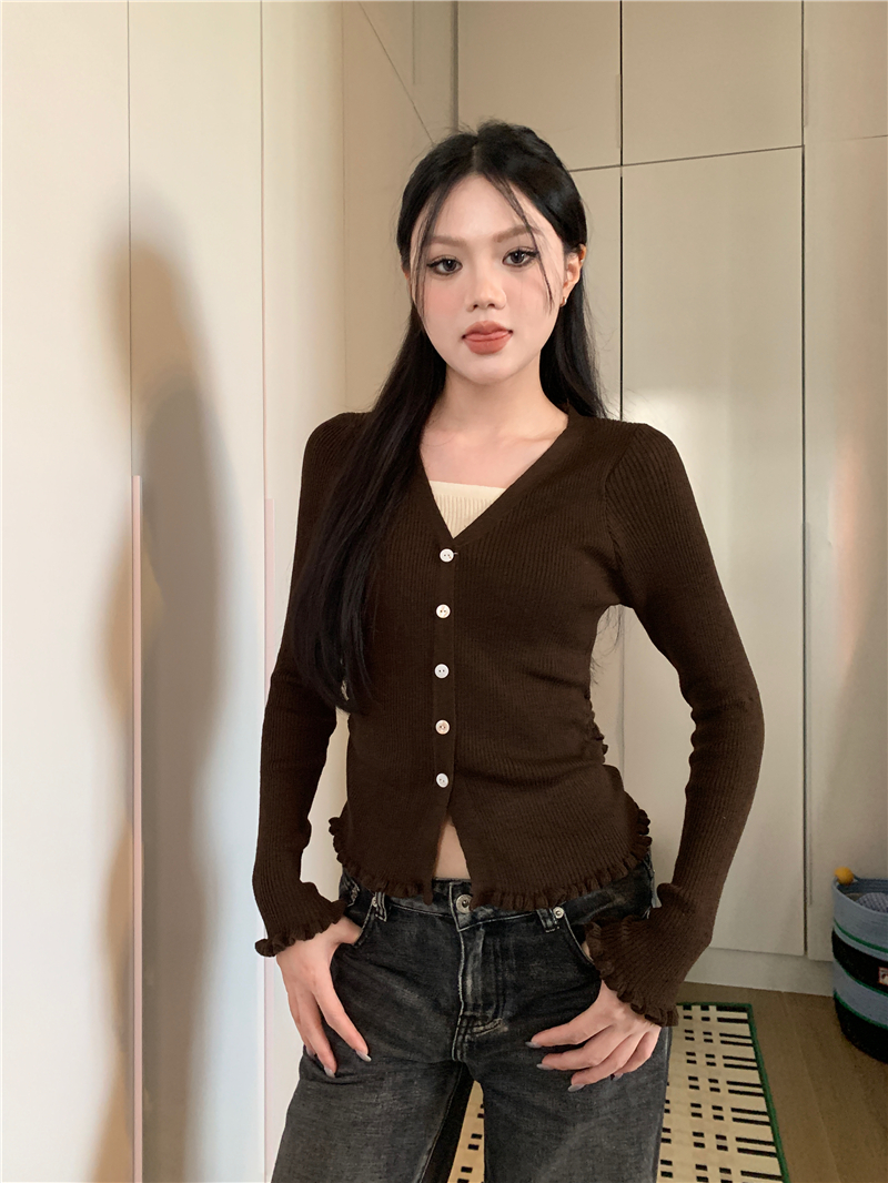 Actual shot of a fake two-piece v-neck long-sleeved sweater top with a funky style