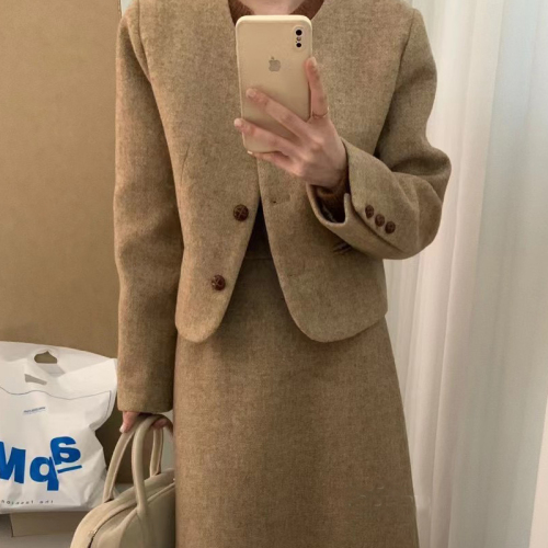 Woollen tweed featherdown suit with a sophisticated, slimming and chic designer vibe, tailored for a discerning, fashion-forward crowd.